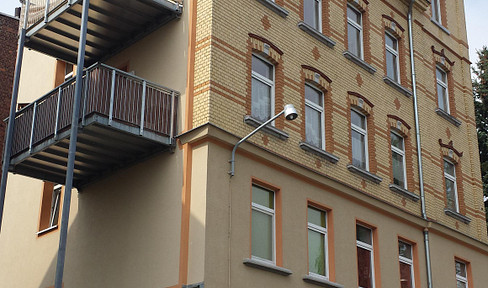 TOP 2-room maissonette apartment with FBH, large balcony and fitted kitchen