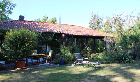 Short-term rental: A charming, rustic bungalow with a large garden.