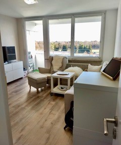 Furnished, very quiet 1-bedroom apartment (located at the back of the building) in Augsburg, with a view of greenery.