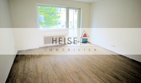 Refurbished 3-room rental apartment with balcony - first floor - residential area close to the city center