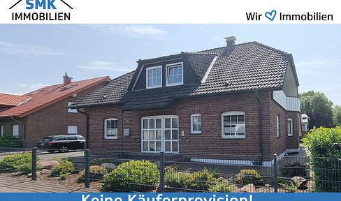 Well-kept two-family house with garages and full basement!