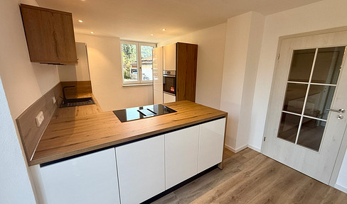 Beautiful apartment - like a semi-detached house - with approx. 350 m² garden