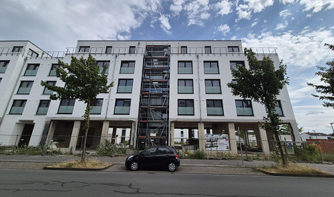 Apartment under construction, located near the city center in the Graf Bismarck harbor district, with a balcony overlooking the marina/canal, suitable for 2 people.