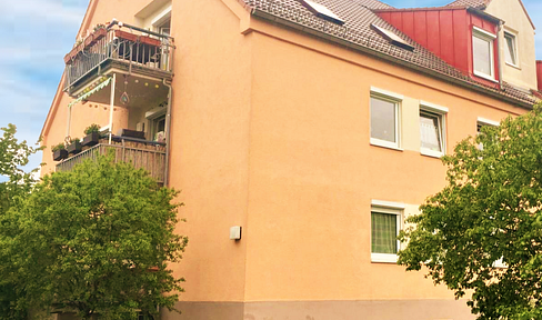Bright 2-room apartment on the 2nd floor, featuring a kitchen, balcony, parking space, and a storage room in the basement.