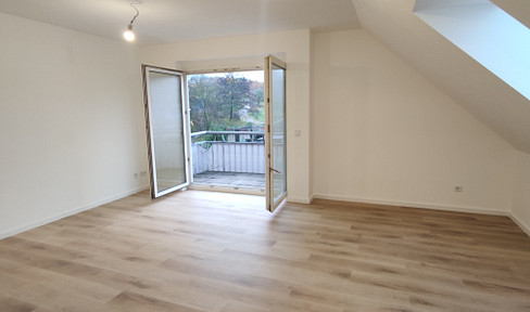 Modernized 2-room apartment on the 2nd floor with fitted kitchen, balcony, parking space and cellar compartment