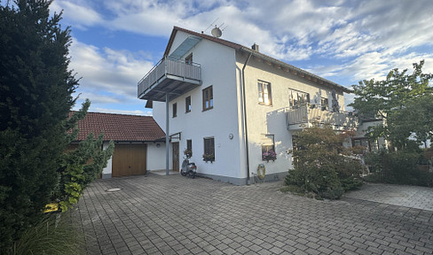 Spacious attic apartment with a balcony and fitted kitchen in a quiet location.