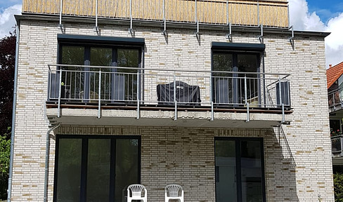 Helle 3 Zi.- Wohnung mit Terrasse + Garten in ruhiger Wohnlage