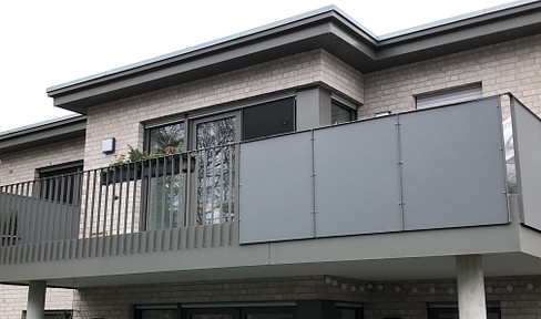 Central prime location: newly built apartment with 2 balconies, fitted kitchen and underground parking space