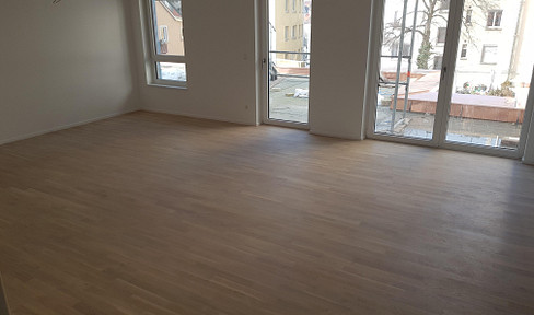 exklusive 2-Zimmer-Terrassenwohnung mit EBK, Stellplatz und Wallbox in Top Lage