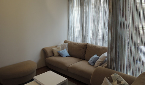 Centrally located 3-room apartment with open-plan kitchen and 2 balconies.