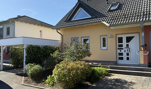 Modern semi-detached house with an open-plan living area.
