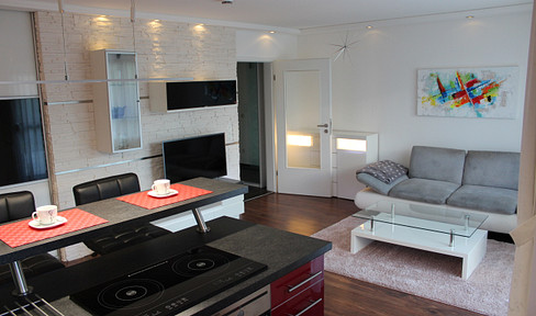 Exclusive furnished garden apartment with a terrace and a private small garden, located in Unterschleissheim, close to BMW.