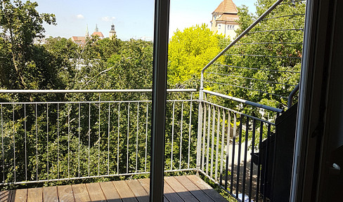 2.5 room apartment in an old building above the rooftops of Augsburg