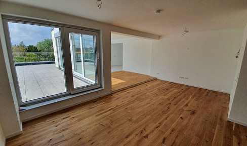Großzügige Wintergarten-Wohnung mit großer Süd-Westterrasse in Zentrumnähe