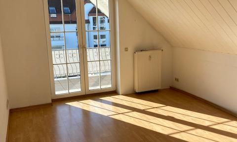 Bright attic apartment with balcony in Cologne-Volkhoven