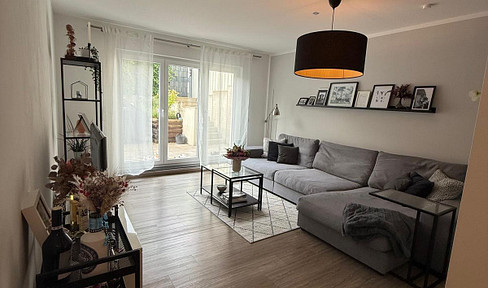 Helle Souterrain-Wohnung mit Terrasse (Südausrichtung)