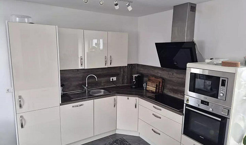 4 Zimmer-Neubauwohnung mit Einbauküche ink. E-Geräten und Stellplatz