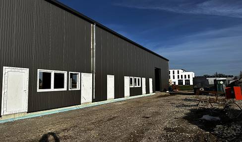 Modern swimming pool complex with offices.