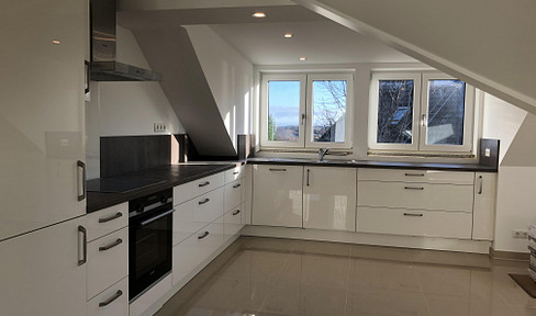 Exclusive top floor apartment with 2 rooms and loggia in a preferred location in Plön