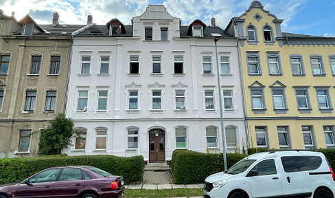 Fully rented apartment building with balconies and large garden