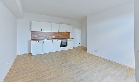 2 Zi.-Hochparterre-Wohnung im Grünen mit Küche und Vollbad