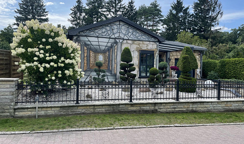 Angled bungalow upscale and modernized, with pool directly on the breeze.