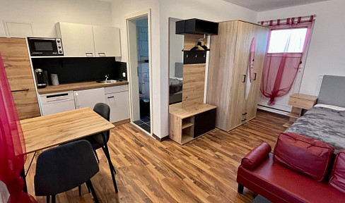 Modern furnished studio apartment near trade fair and city center