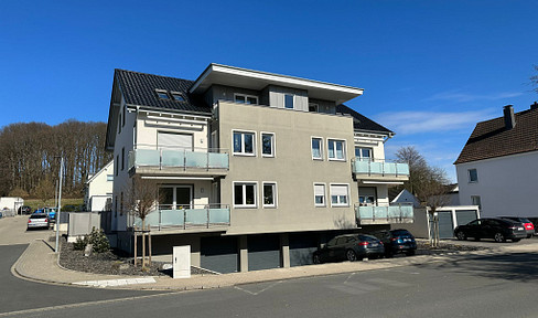 Modern, bright ground-floor apartment with a balcony.