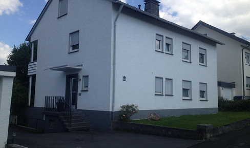 2-family house with basement, garage and attic as expansion reserve