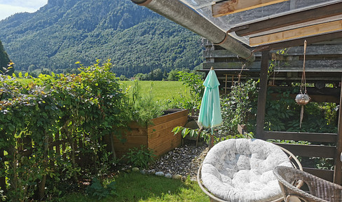 Exclusive living by the water - stylish terrace apartment in Brannenburg