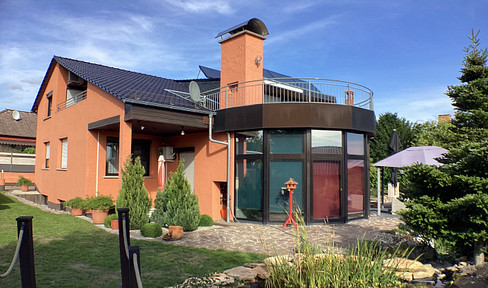 Stylish property with a separate apartment, wellness area, and large garden, located near Coburg.