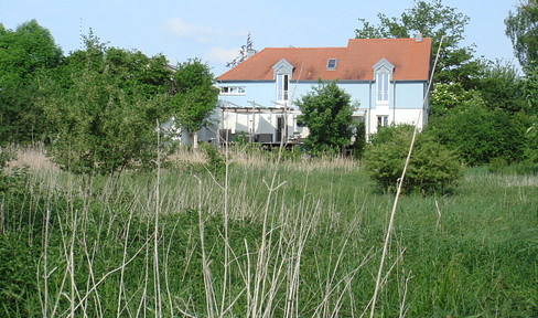 20 minutes from Lake Ammersee: top-end detached house unobstructable on a biotope with its own stream access
