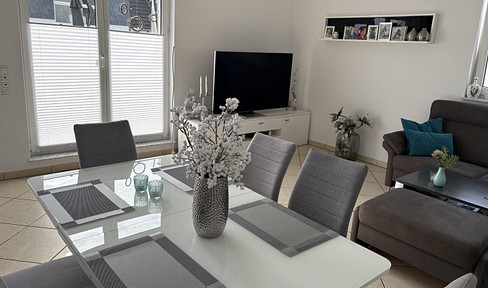 Elegant 4-room maisonette apartment with 2 bathrooms and a large rooftop terrace, located in Alt-Hürth.