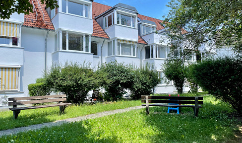 Bright and newly renovated apartment with a terrace in a green area, including a parking space in an underground garage.