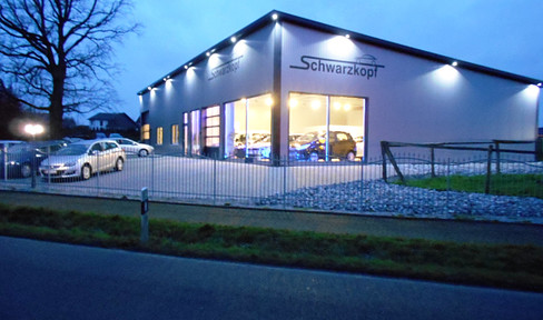 Commercial building conveniently located at present car dealership but versatile in use