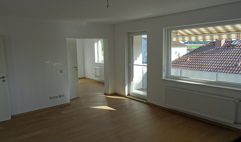 3.5-room apartment on the ground floor, with a balcony and kitchen.