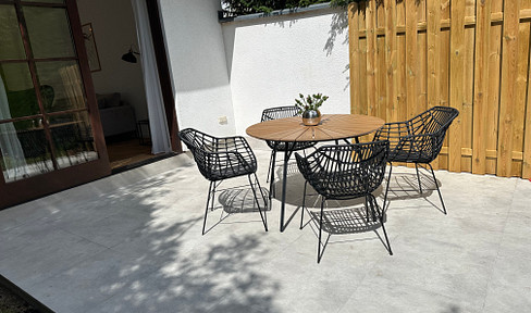 Charmingly furnished ground floor apartment with terrace and quiet garden