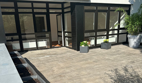 Beautiful 2-room apartment with a large terrace, balcony, and garage!