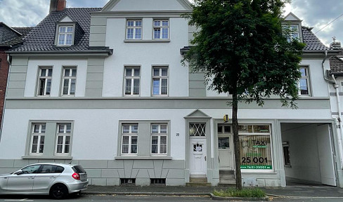 Commercial property with residential potential, including parking spaces, located in a central area of Ratingen-Mitte.