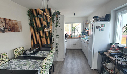 Modern 3-room apartment with balcony, fitted kitchen, and comfortable, climate-controlled flooring.