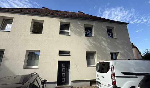 Zentrale, helle Etagenwohnung mit Balkon und Gartenteil
