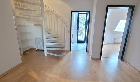 Maisonette penthouse apartment near the Rhine