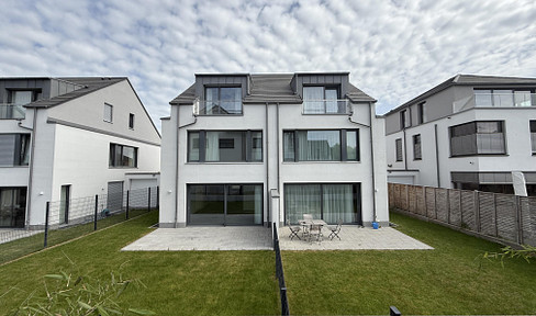 Brand new, high-quality architect-designed single-family home with 6 rooms and a fitted kitchen, located in Bad Homburg, built to KfW 55 standards.