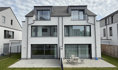 High-quality architect-designed single-family house with 6 rooms and a fitted kitchen, located in Bad Homburg, built to KfW 55 standard.