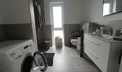 "Beautiful, modern, centrally located 2-room apartment on the upper floor."