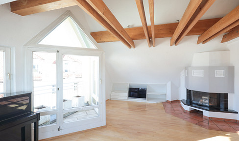 Bright, spacious top floor apartment in Weingarten with very good energy values. Central with a view of the Basilica.