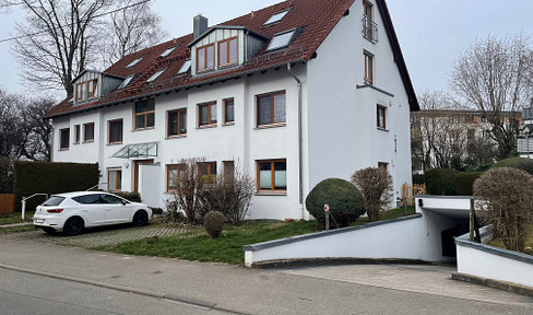 Beautiful 2-room apartment with balcony and underground parking