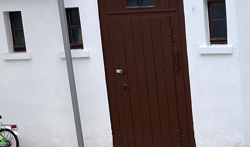 Small dry storage room for e.g. e-bike or motorcycle