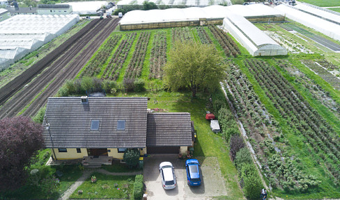 Grünes Paradies: Idyllisches Familienhaus mit großem Garten und Potenzial für Einliegerwohnung