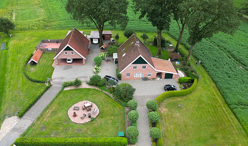 Picture book remaining farm for sale / space for 2 families / in border location - Netherlands